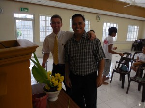 Elder Burbidge and the Branch Mission Leader