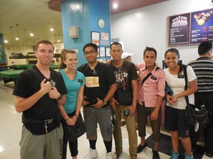 Elder Burbidge and members from his zone at a bowling activity