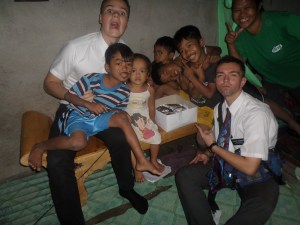 Elder Collins and Elder Burbidge with the birthday party kids!